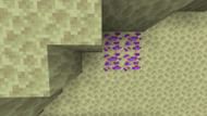 Ender ore as seen in the Ender Gems mod (Image via FunkyGamer47/Planet Minecraft)